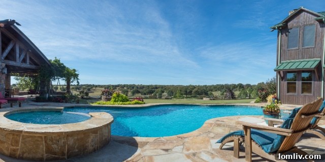 Exterior shot of a meticulously maintained ranch building, blending functionality with aesthetic.