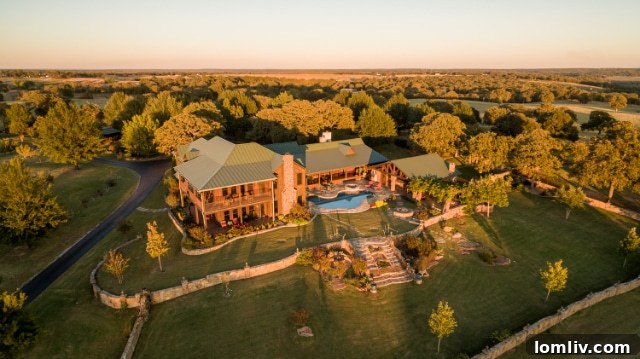 Stunning view of Terry Bradshaw's Oklahoma ranch, showcasing vast landscapes and pristine facilities.