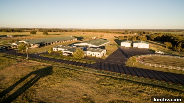 Lush green pastures stretching across the property, ideal for grazing livestock.