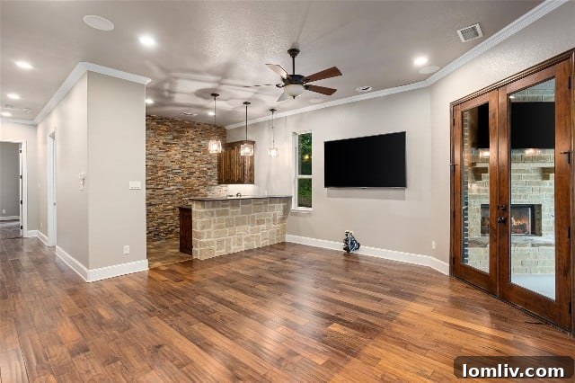 Family Room with Wet Bar leading to Outdoor Space