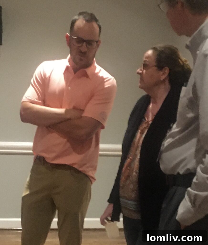 Dallas City Councilwoman Paula Blackmon speaking with Matthew Vruggink of Ojala Holdings.