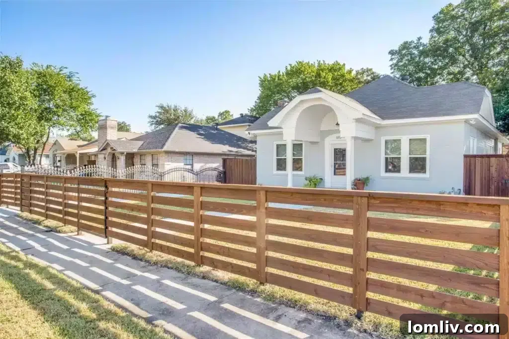 Gated front yard of 610 Cedar Hill Avenue, perfect for pets and outdoor living