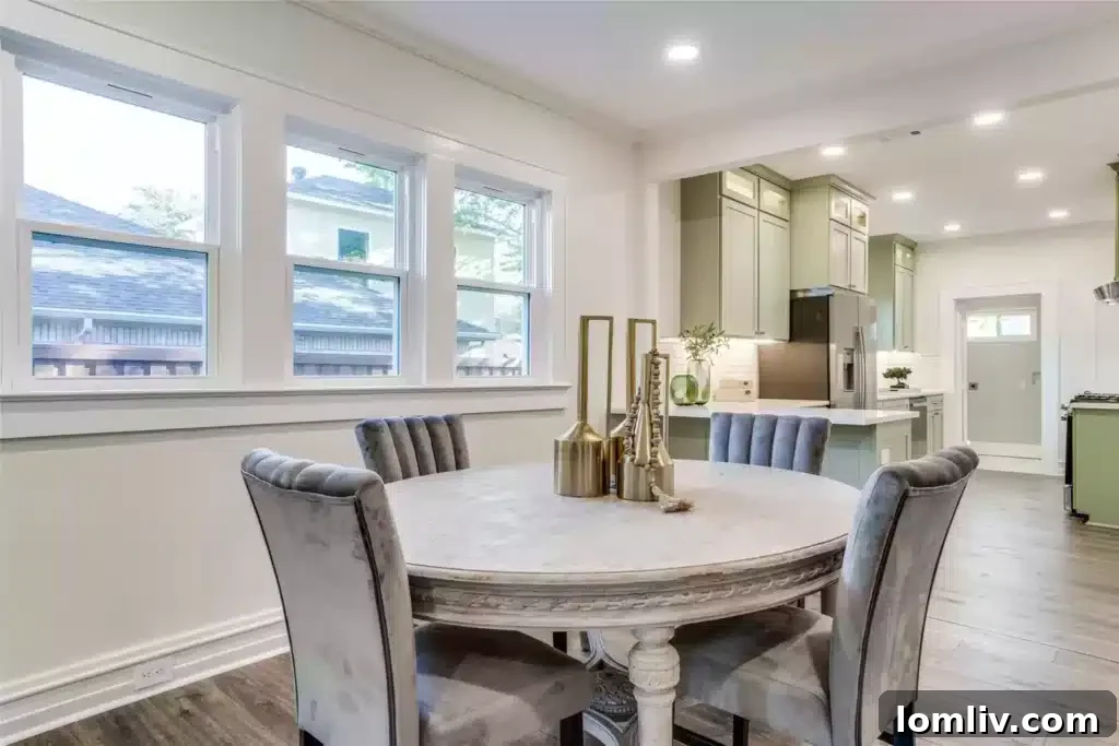Modern kitchen featuring subway tile backsplash and display lighting at 610 Cedar Hill Ave