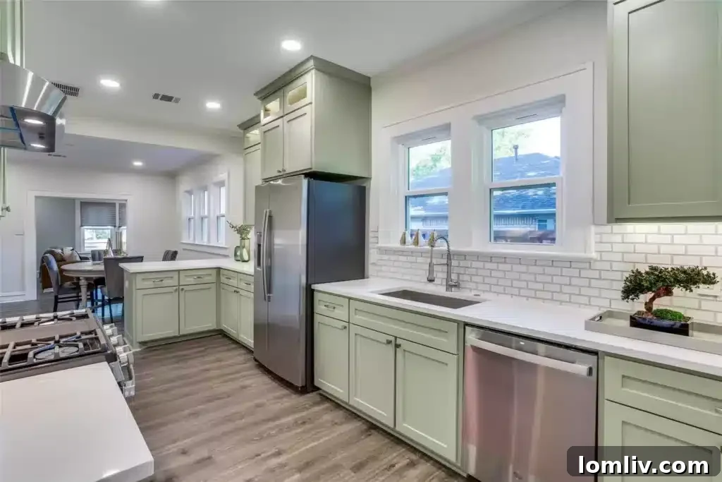 Seamless flow from kitchen to dining area in the renovated 610 Cedar Hill Avenue home
