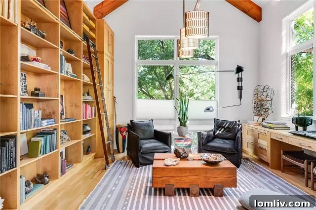 Stylish home office interior with lush outdoor views at 5610 Farquhar Lane