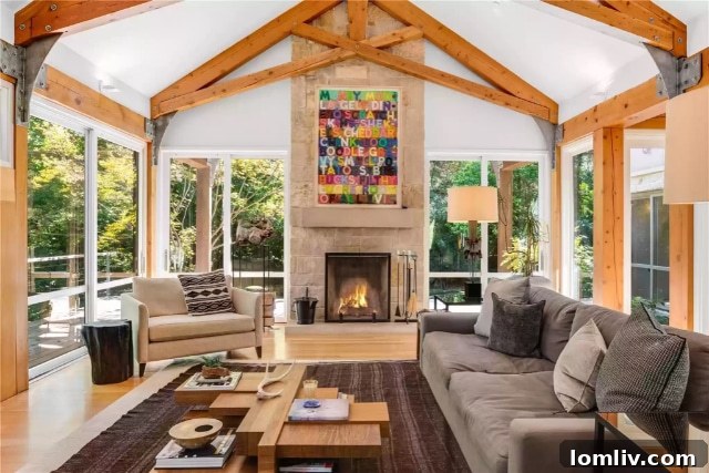 Lush backyard view of 5610 Farquhar Lane with mature trees and pond