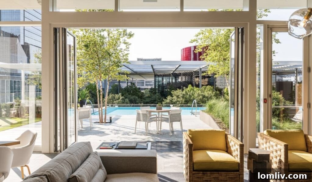 Master bedroom with panoramic city views and sophisticated design at 1747 Leonard St