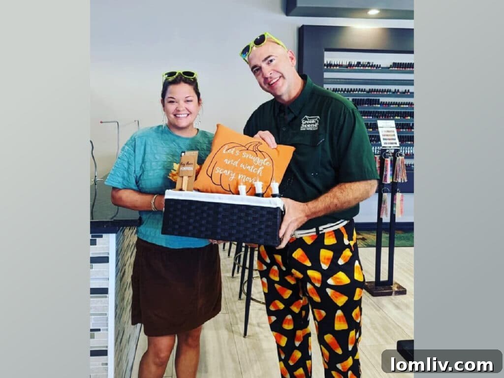 Clayton from Green Scene Home Inspections wearing festive candy corn patterned pants at a realtor event.