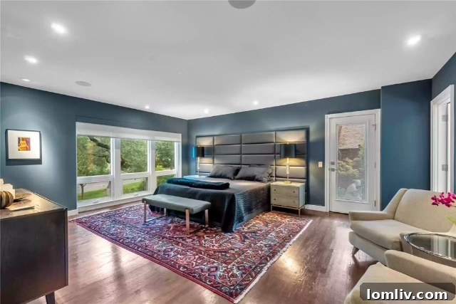 Elegant Master Bedroom with Picture Window and Smart Shades
