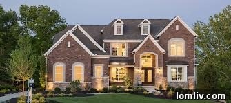 Community streetscape featuring new homes by M/I Homes, emphasizing planned development.