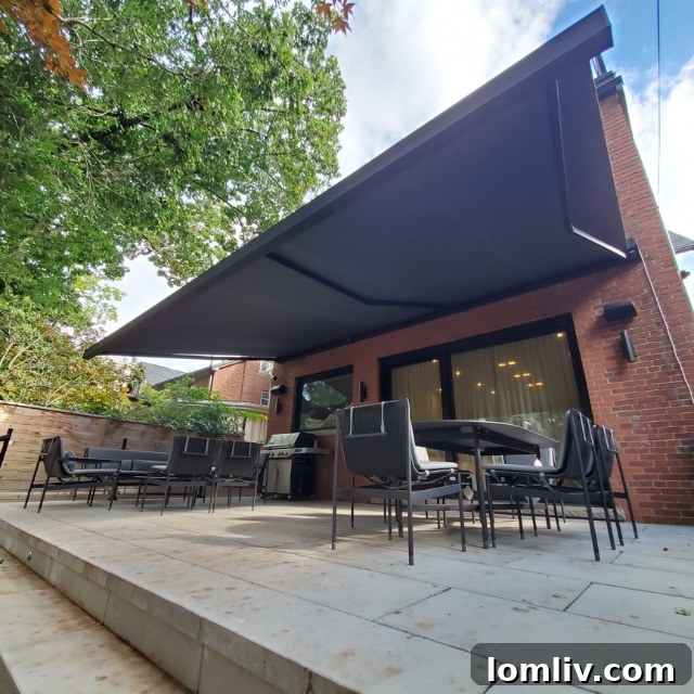 Stylish outdoor lounge protected by a Corradi retractable roof