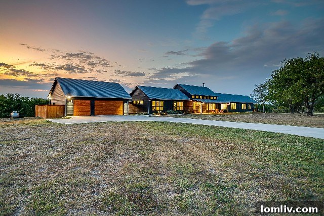 Expansive nine-acre modern farmhouse with over 2,200 sq ft of covered porch