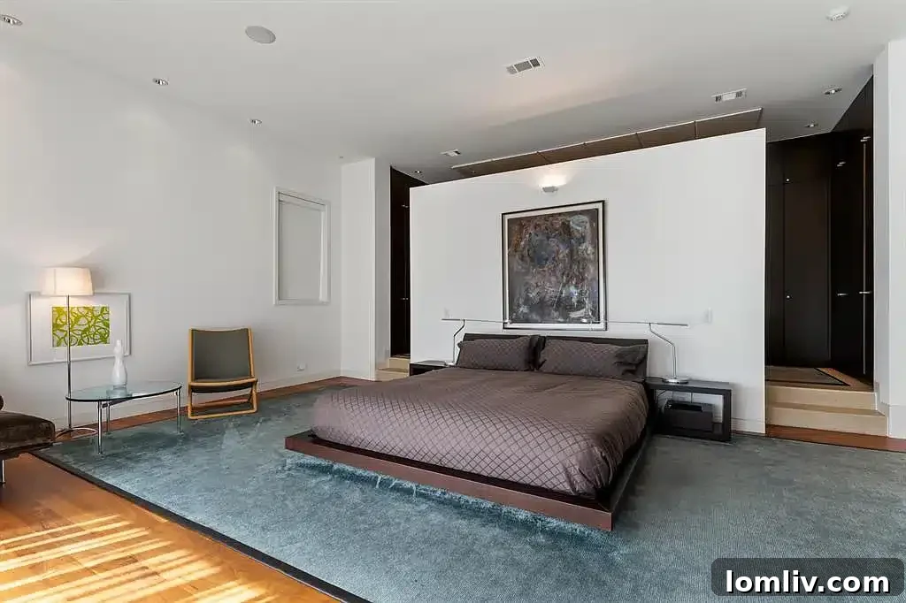 Luxurious primary suite with private patio access