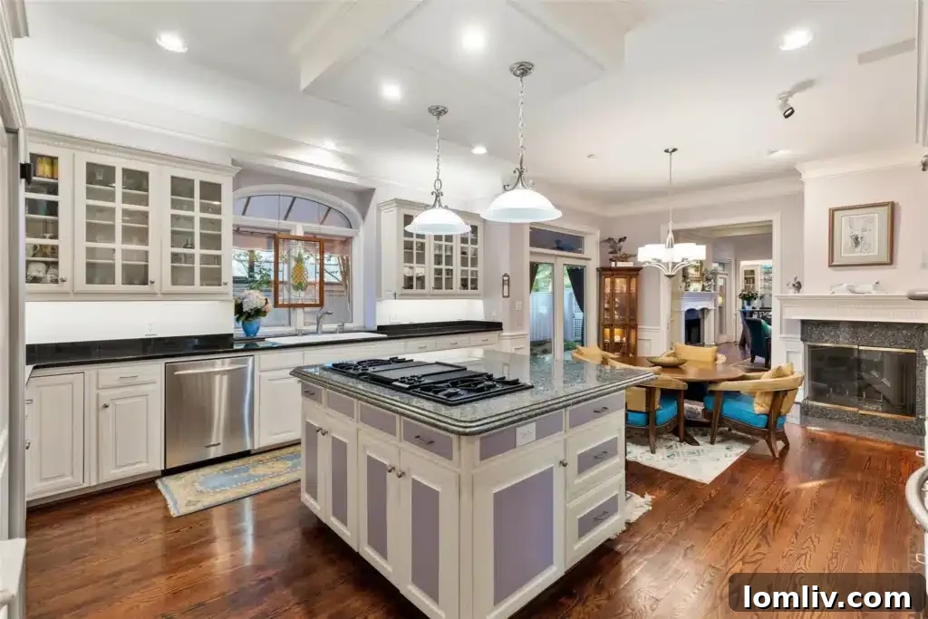 High-end gourmet kitchen with stainless and paneled appliances