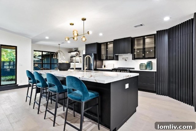 A beautifully designed interior space at 7336 Lakehurst, showcasing the open concept and refined finishes of the Ranch renovation.