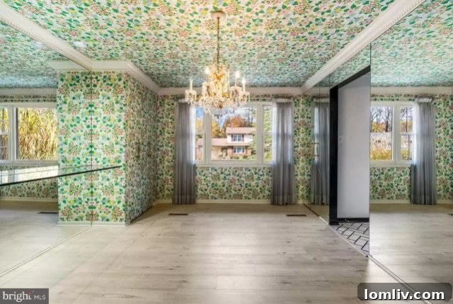 Elegant dining room with floral wallpaper on the ceiling and reflective surfaces