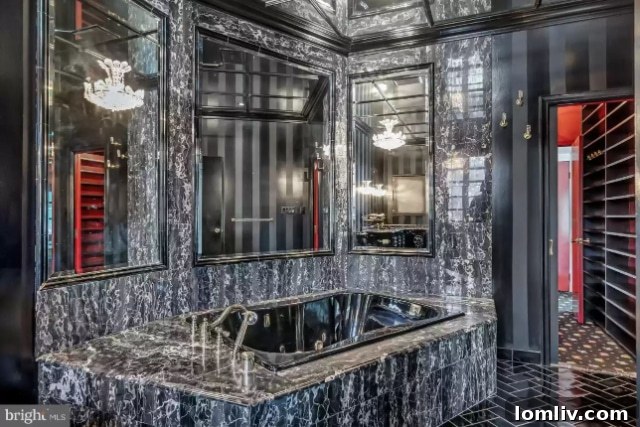 Another view of a bathroom, showcasing ornate details and lighting