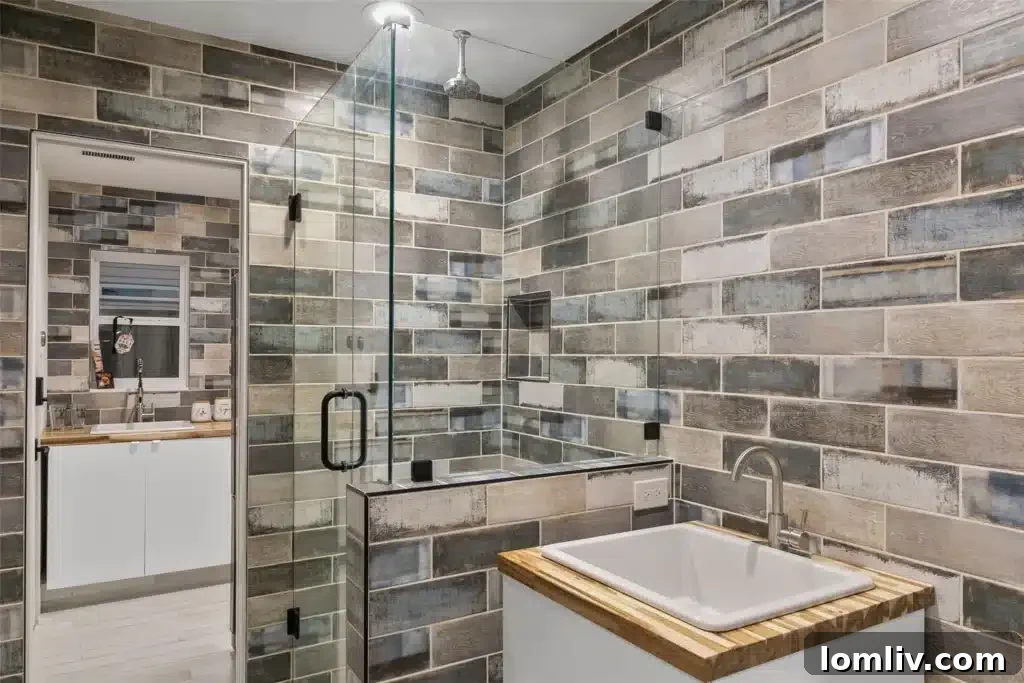 Ultimate Relaxation: Walk-in Shower and Designer Finishes in Primary Bath