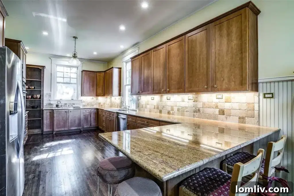 Dining room at 5107 Junius, featuring the historic chandelier