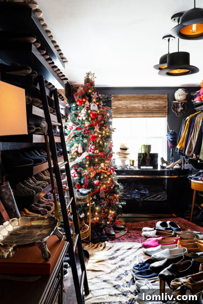 Personal collection of ornaments on a closet Christmas tree