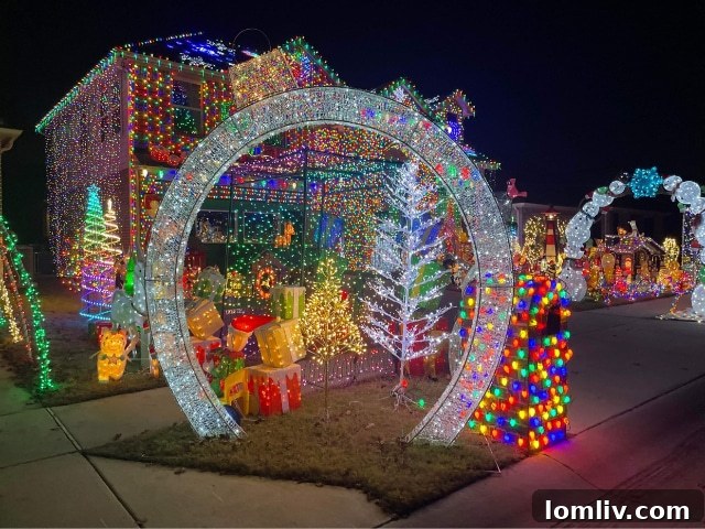 The Burkman family of Frisco, Texas, renowned for their appearance on ABC’s The Great Christmas Family Light Fight, stands proudly in front of their spectacularly illuminated holiday home, adorned with thousands of festive lights.