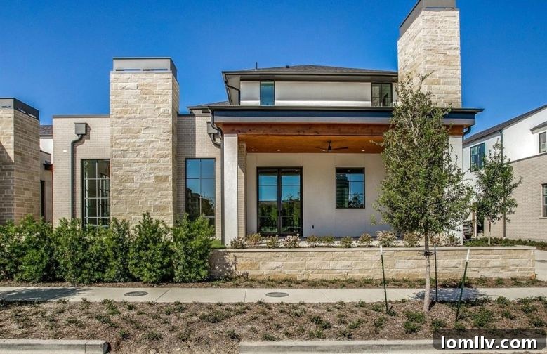 Stunning exterior of a luxury home at 9851 Kingsway Ave in Dallas, Texas