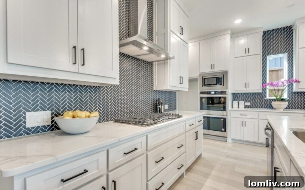 Modern kitchen with large island and walk-in pantry at 4407 Sexton Lane