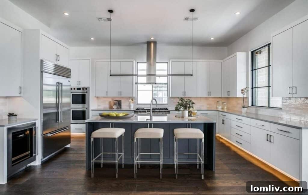 Bright, open living space with high ceilings and large windows at 9851 Kingsway Ave