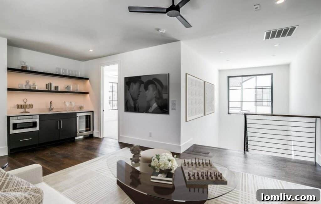 Luxurious primary bathroom with soaking tub and modern finishes at 9851 Kingsway Ave