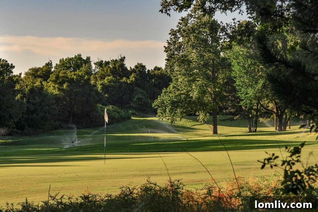A vibrant green golf course at Mesa Vista Ranch, adding to the estate's extensive leisure amenities.