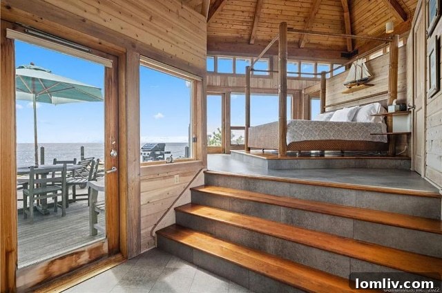Santa, This Christmas, Lavish Me With a Connecticut Island Home 13 Exquisite dining area with large windows, offering an immersive view of the surrounding seascape