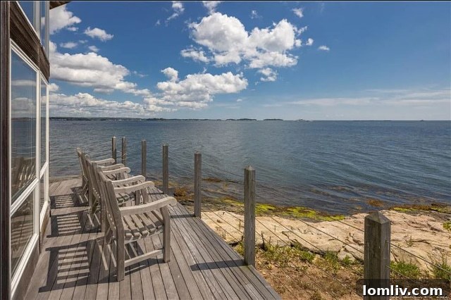Santa, This Christmas, Lavish Me With a Connecticut Island Home 9 Spacious living room with vaulted ceilings and panoramic views of the water from a luxury island home