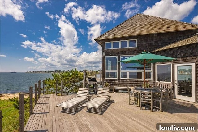 Santa, This Christmas, Lavish Me With a Connecticut Island Home 10 Cozy bedroom with a view of the ocean, perfect for an island retreat and peaceful mornings