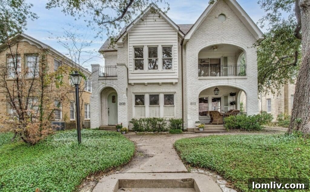 Street view of the duplex in a tree-lined neighborhood