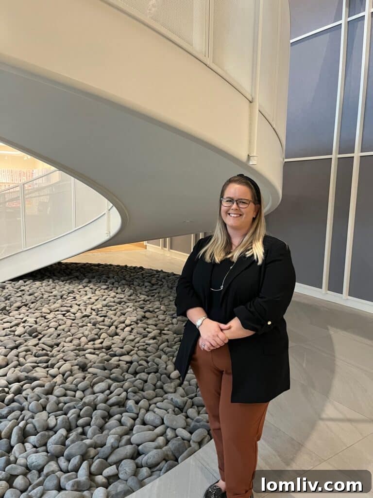 Jessica Steel, Project Manager for MetroTex HQ, standing outside the building