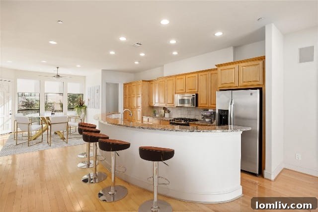Three-story townhome with open floor plan and large windows
