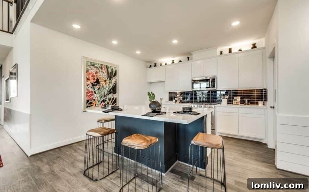 Gourmet kitchen with stainless steel appliances and large island