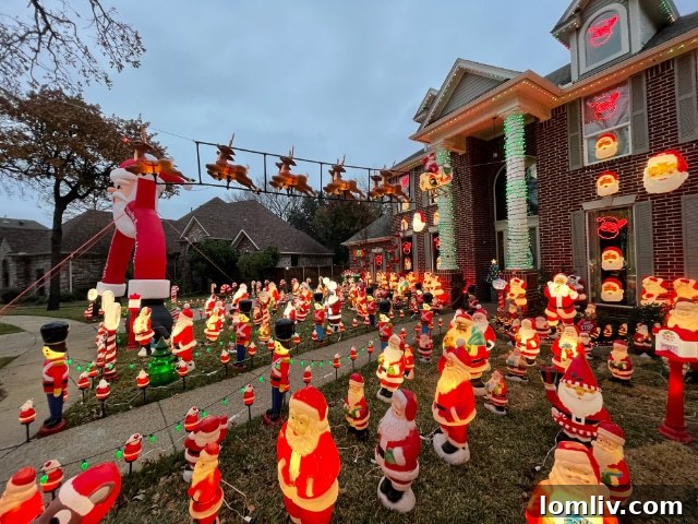 A close-up view of dozens of vintage blow-mold Santas, brightly illuminated against the night sky, exuding a warm, nostalgic glow.