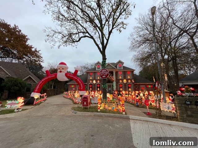 A panoramic shot of the festive holiday decorations, including the vast array of Santas, lights, and other seasonal embellishments that cover the yard.