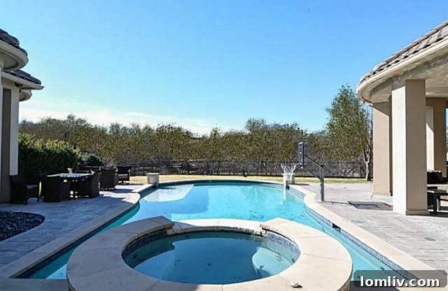 Stunning Pool and Spa Area with Lush Landscaping