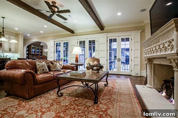 Cozy Family Room with Oak Beamed Ceiling