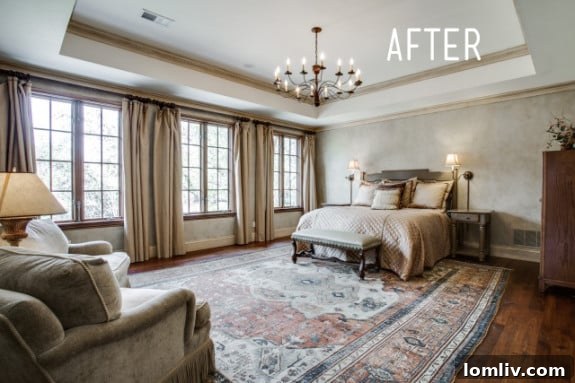 After: A serene and luxurious master suite with elegant furnishings, highlighting the dramatic tray ceiling and bank of windows