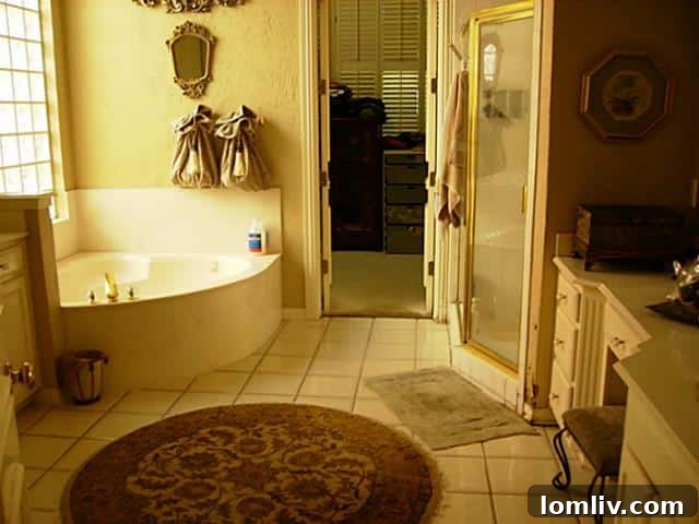 Luxurious master bathroom at 5219 Scarborough Lane, featuring modern fixtures and elegant design