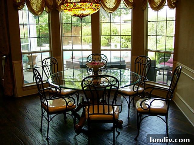 Breakfast area at 5219 Scarborough Lane appearing dark and potentially blurry due to poor lighting and camera stability