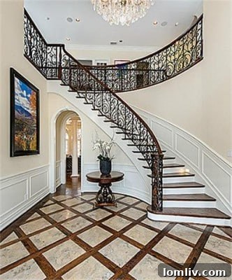 9346 Sunnybrook - Elegant Foyer with Wrought Iron Staircase