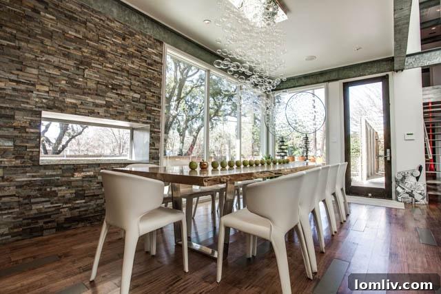 Wide shot of the modern kitchen and dining area in 6607 Desco Drive, Dallas