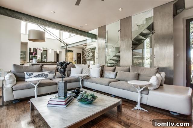 Elegant living room at 6607 Desco Drive with ample natural light and contemporary furniture