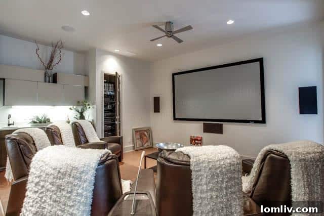 Dedicated media room or entertainment space in the luxury home at 6607 Desco Drive