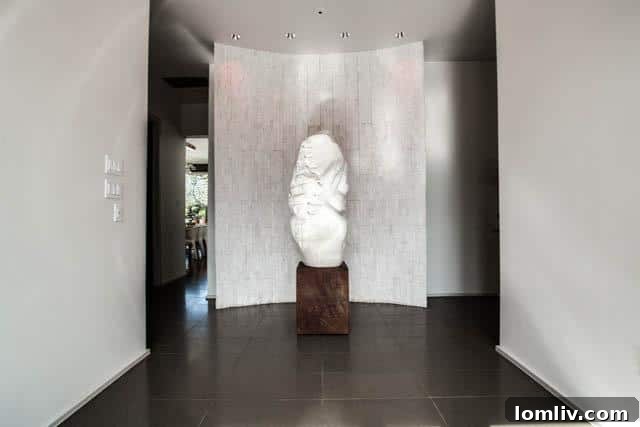 Luxurious foyer of 6607 Desco Drive, showcasing modern design and spaciousness
