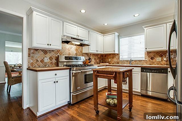 Friday Four Hundred: Charming Traditional Home in Stonewall Jackson Country 5 Modern Kitchen with Stainless Steel Appliances at 6055 Anita Street